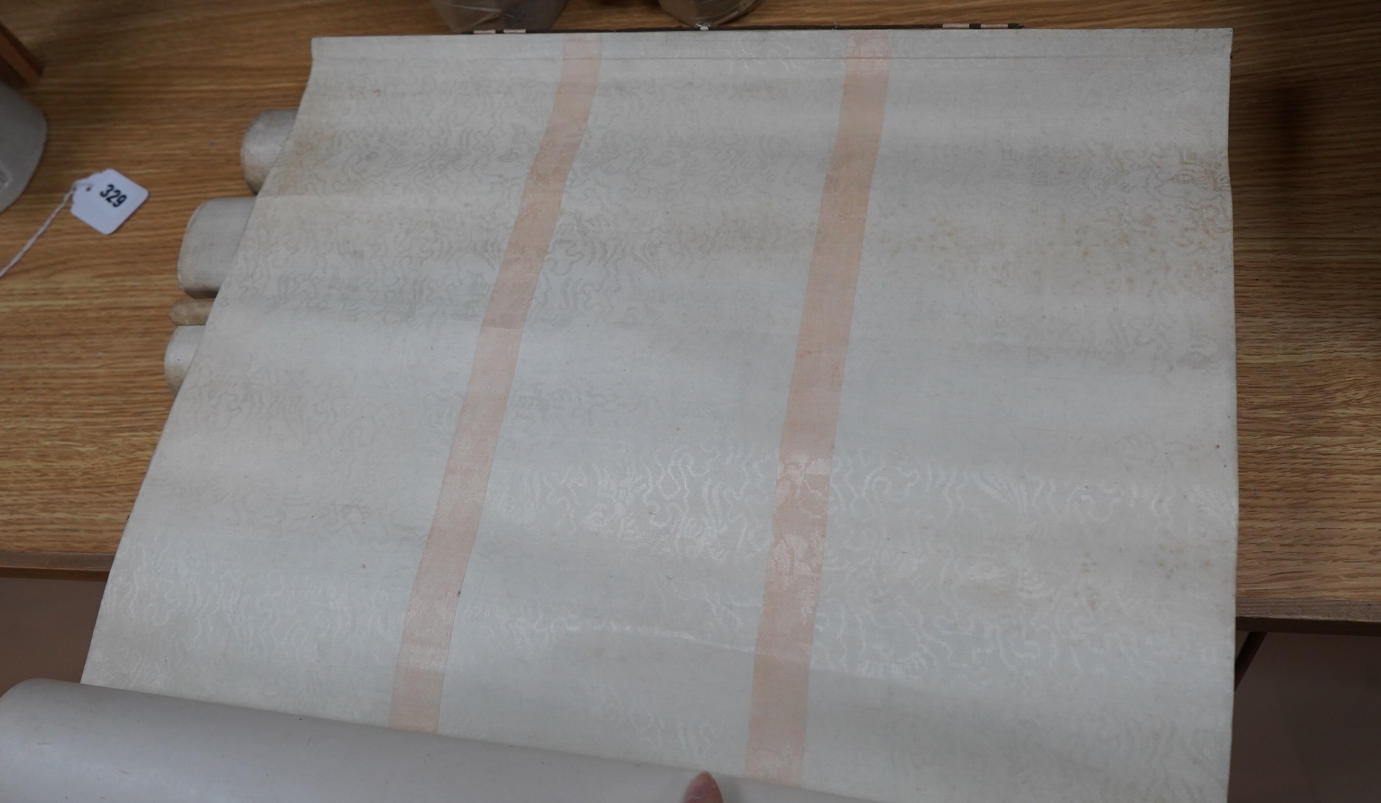 A set of four Chinese scroll paintings of ladies before landscapes, 48cm wide. Condition - fair